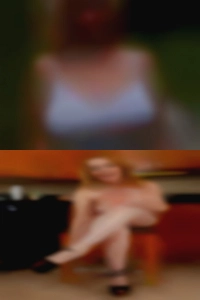 Horny nude woman working out.
